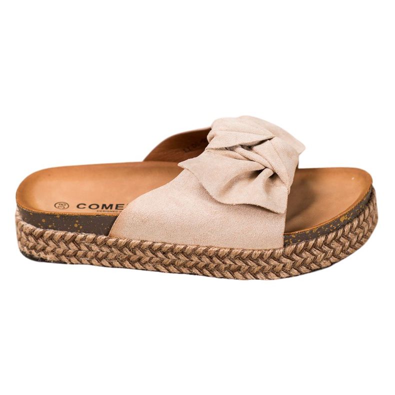 Comer Tofflor På En Hög Plattform brun