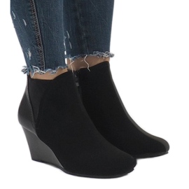 Eleganta stövlar på kil 1455 svart