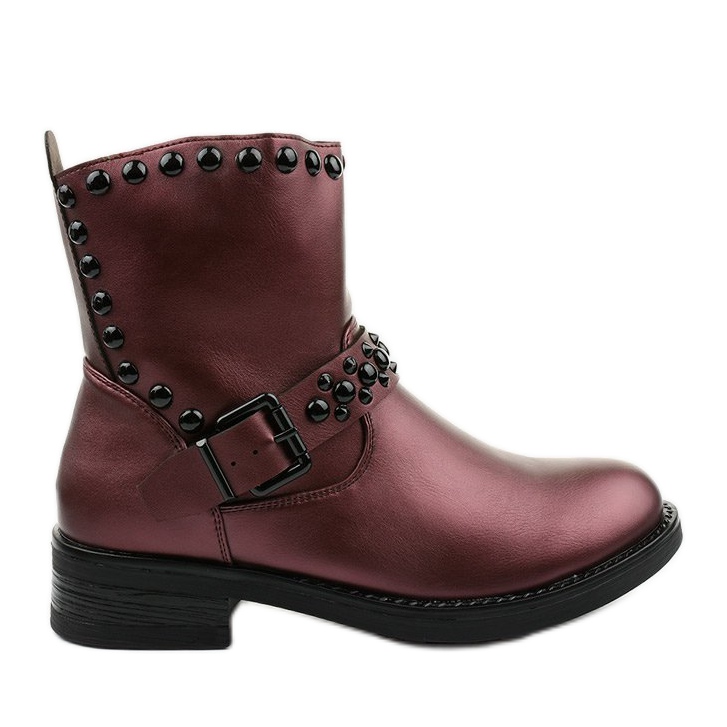 Röda damstövlar för damer med morgonlita