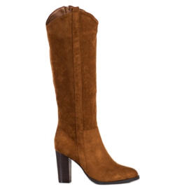 Seastar Snygga stövlar på en pelare brun