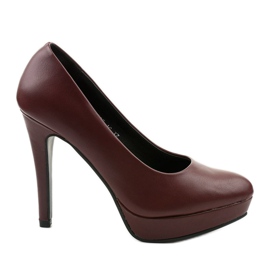 Rödbruna matta pumpar på en densitetsklack