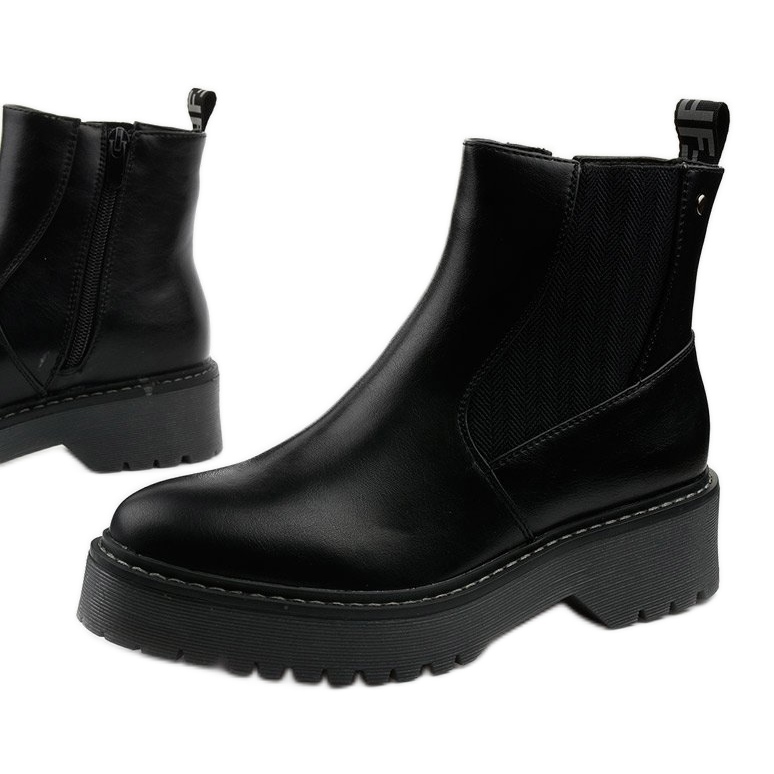 Svarta platta stövlar i Cavern ekoläder