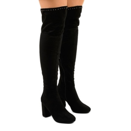 Svarta, isolerade stövlar med en övre infrarödstråle