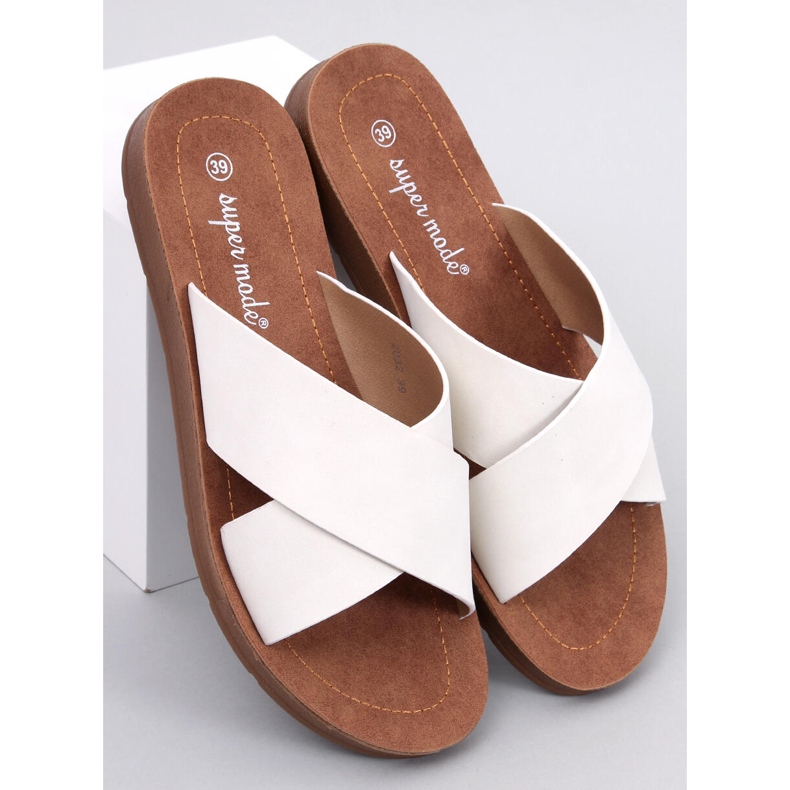 Ryan White damtofflor vit 1