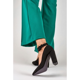 Damsvarta pumps fästa vid ankeln 2