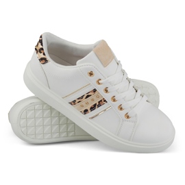 Vita damsportskor med en delikat dekoration 2