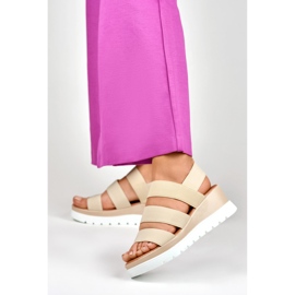 Beige elastiska sandaler med låg plattform 2