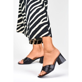 Svarta tofflor för kvinnor på låg klack 1