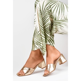 Kvinnors gyllene tofflor på låg klack 1