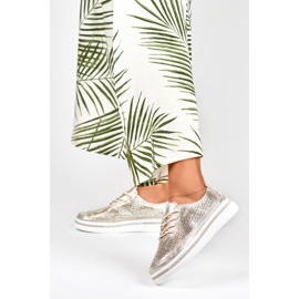 Gyllene sportskor för kvinnor gjorda av naturligt läder 2