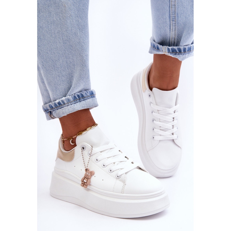 PS1 Damsportskor på en massiv plattform Vit och guld Mariell 1