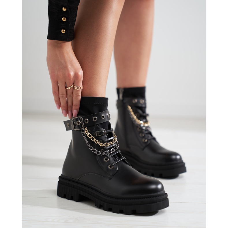 Kvinnliga arbetare med Shelovet-kedjor svart 1