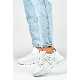Vita damsneakers med silverkant 2