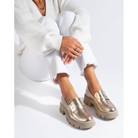 Dammockasiner i guld på tjock sula från Shelovet gyllene 1