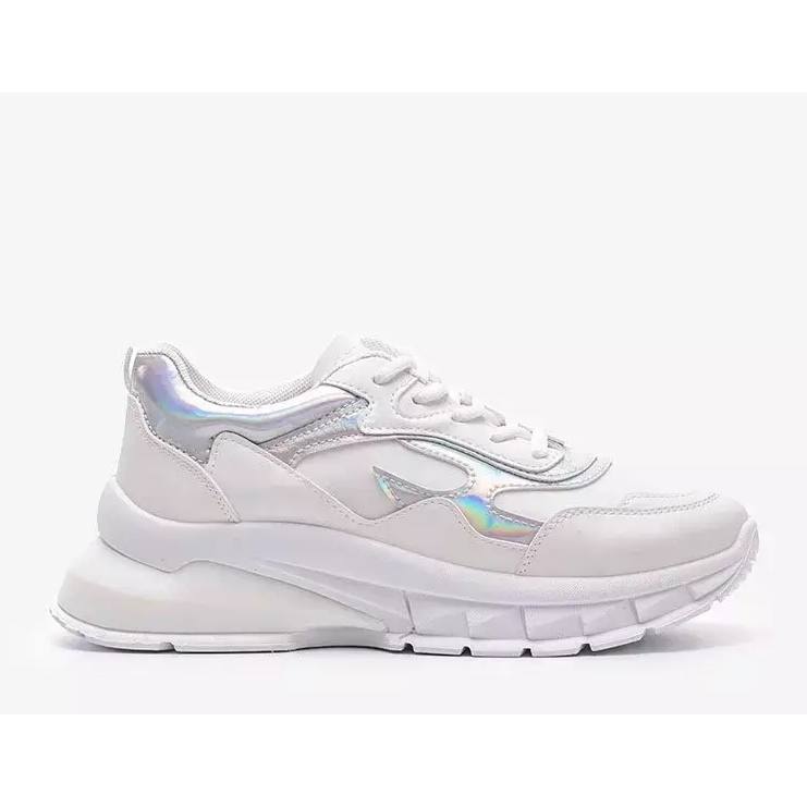 Vita sneakers på en tjock Kristen -sula 1