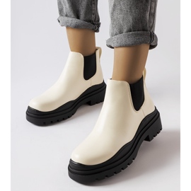 Beiga stövlar på svart plattform från Marinone beige 1