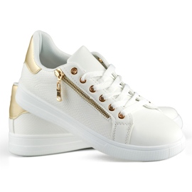 Vita sportskor med gulddragkedja 2