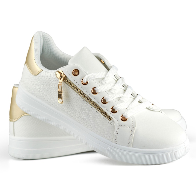 Vita sportskor med gulddragkedja 2