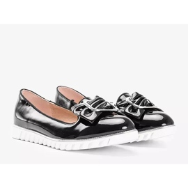 Svartlackerade loafers med en Nemesise -rosett 1