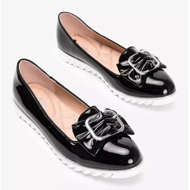 Svartlackerade loafers med en Nemesise -rosett 2