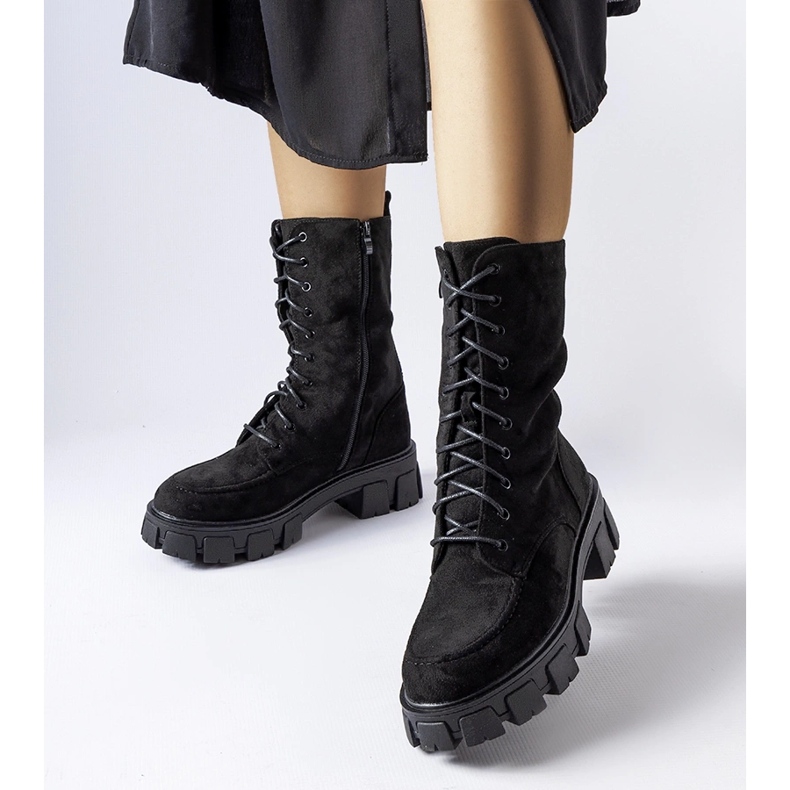 Svarta arbetare i ekomocka med Ines slitbana 1