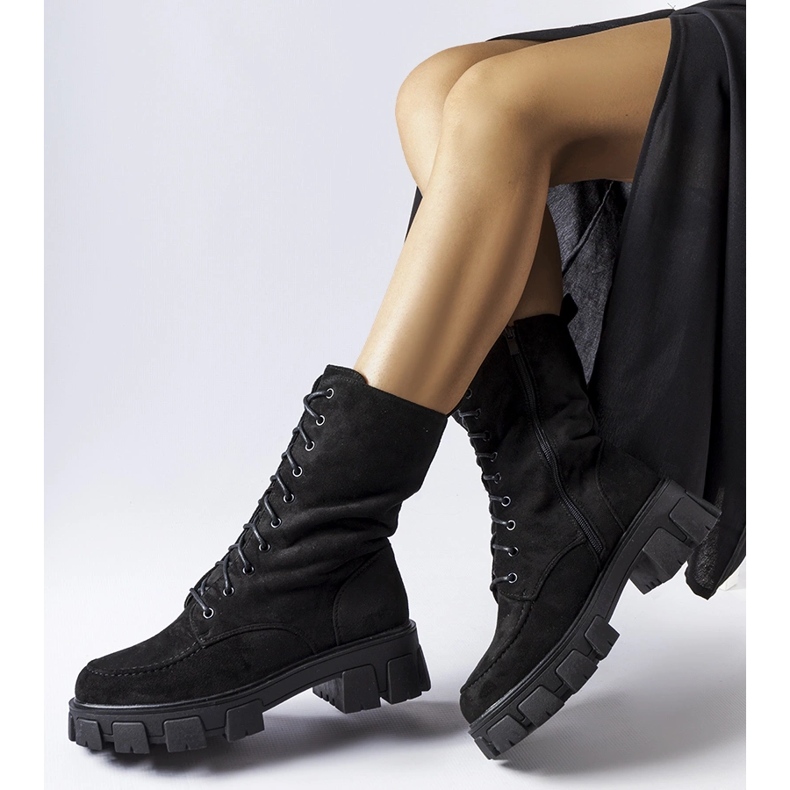 Svarta arbetare i ekomocka med Ines slitbana 2