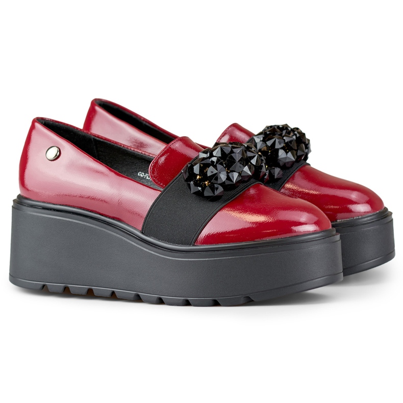 Röda lackskor för damer på en plattform 1