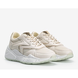 Beige sneakers med en tjock sula med metalliska Kenna -detaljer 1