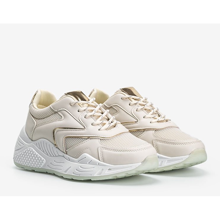 Beige sneakers med en tjock sula med metalliska Kenna -detaljer 1