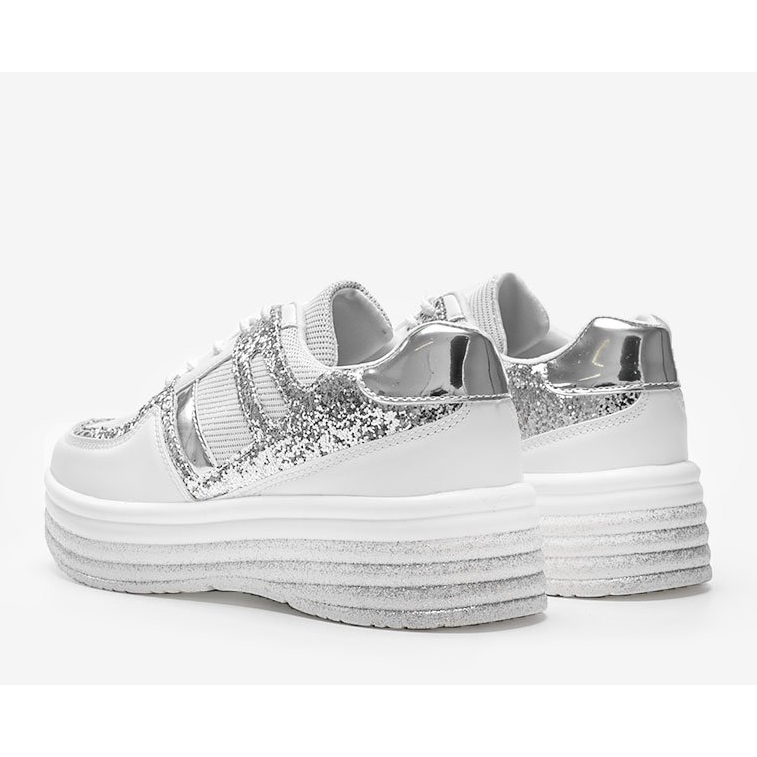 Vita brokad sneakers på en tjock Laurel sula 1