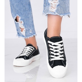 Kvinnors svarta sneakers på en tjock Nolita -sula 2