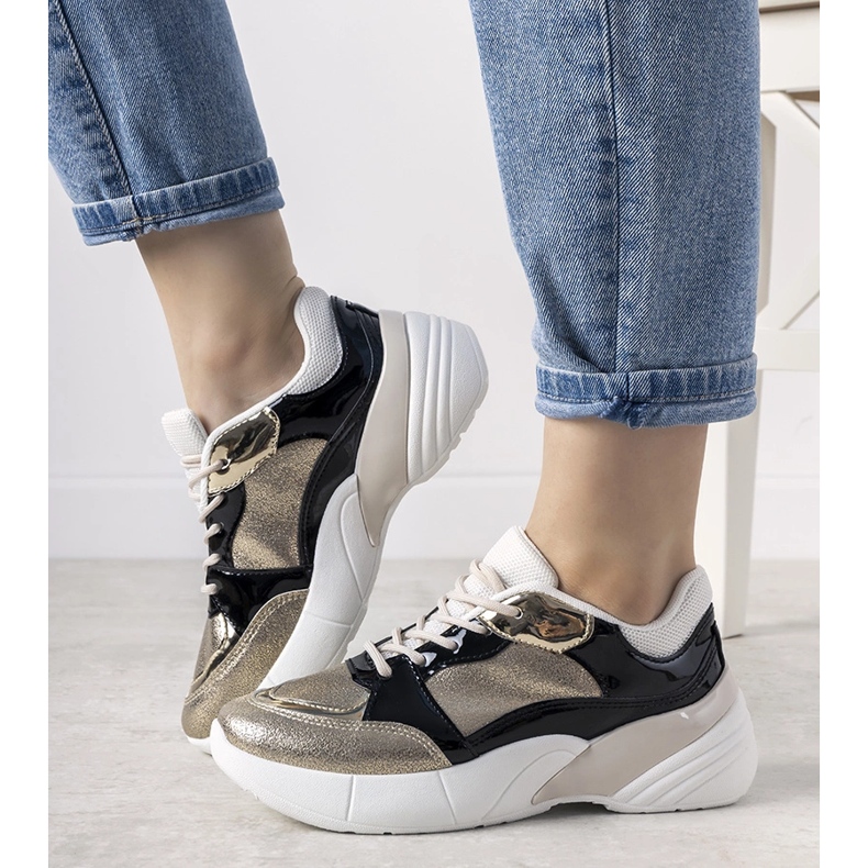 Gyllene sneakers med hög sula Rude svart 1