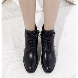 Svarta isolerade stövlar med Padilla-bindning 1