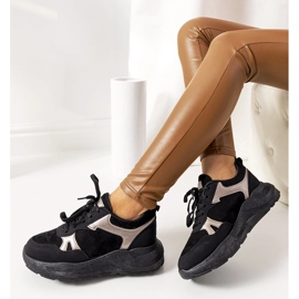 Svarta sneakers med gyllene Davis-accenter 1