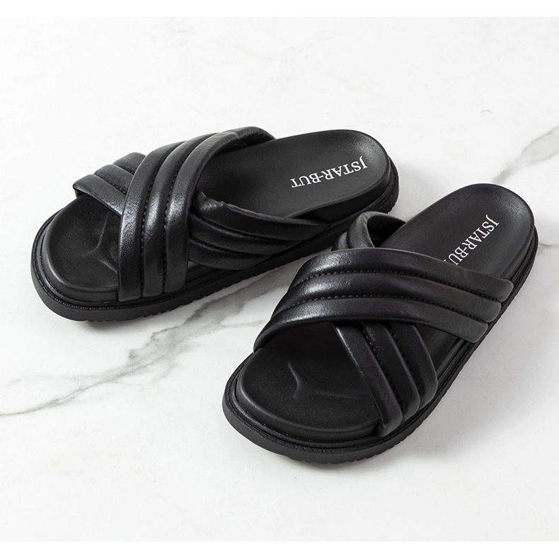 Svarta tofflor på Daintree-plattformen 1