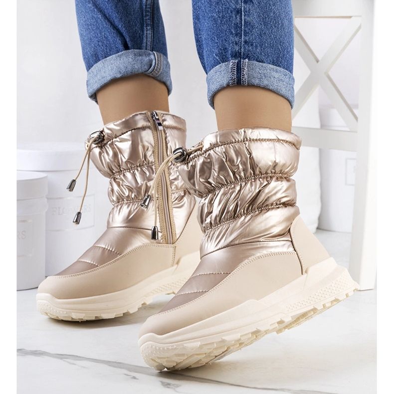 Gyllene snöstövlar med Houle-manschetter beige 1