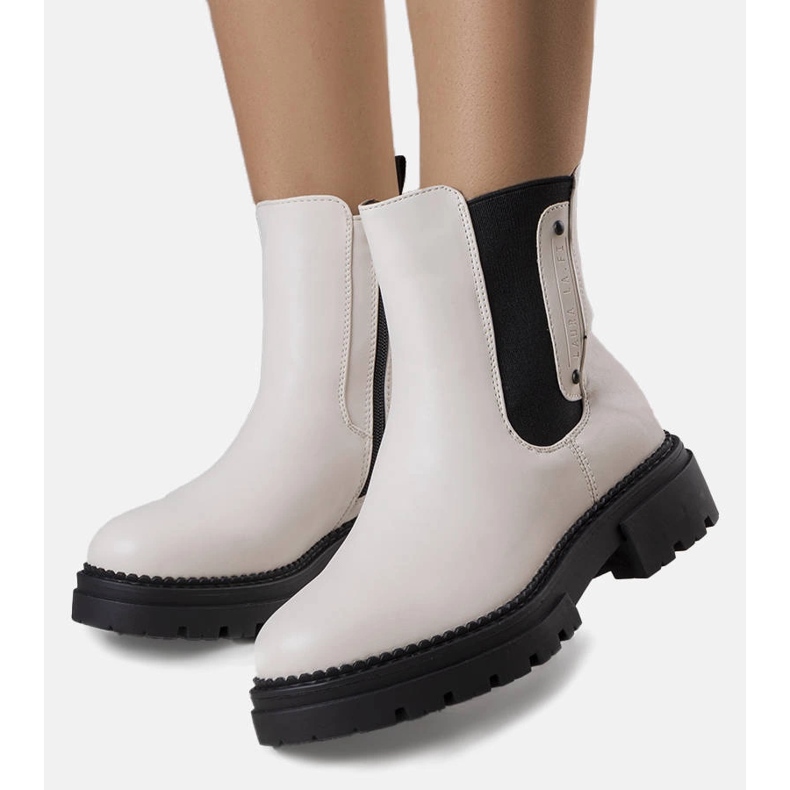 Krämisolerade stövlar från Caron beige 1