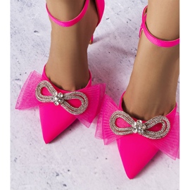 Rosa stift med rosett och cubic zirconias från Bussi 1