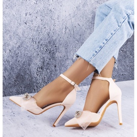 Beige stift med rosett och cubic zirconias från Bussi 1