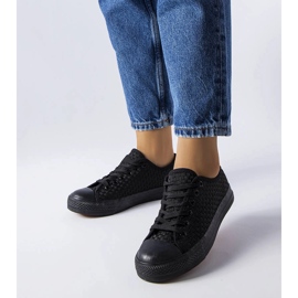 Svarta sneakers i vävt tyg från Thibodeau 1