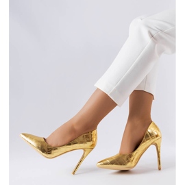 Guldnålar dekorerade med Raison-prägling gyllene 1