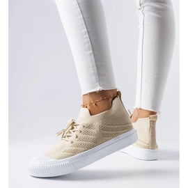 Beige sneakers i stretchtyg från Polaire 1