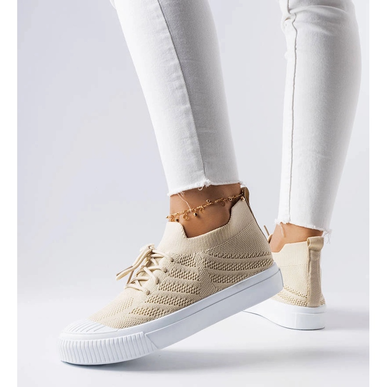 Beige sneakers i stretchtyg från Polaire 1