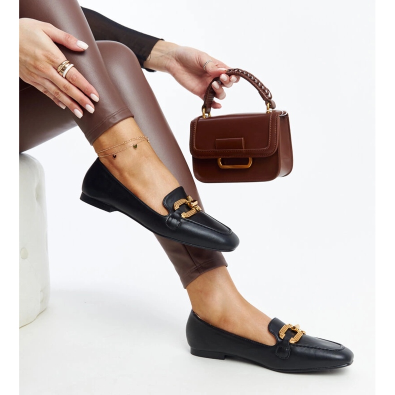 Svarta mockasiner med spänne från Rousseau 1