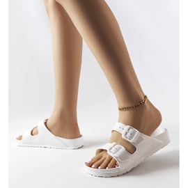 Vita gummireglage med spännen från Eugene 2