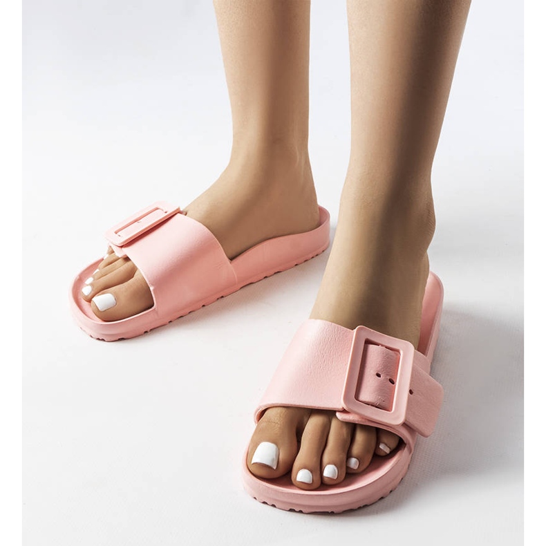 Rosa gummireglage med spänne från Nelm 1