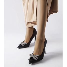 Svarta stift med satinfinish med Mia rosett 1