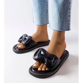 Svarta tofflor med rosett från Lende 1