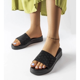 Svarta genombrutna reglage med zirkoner från Irvine 1