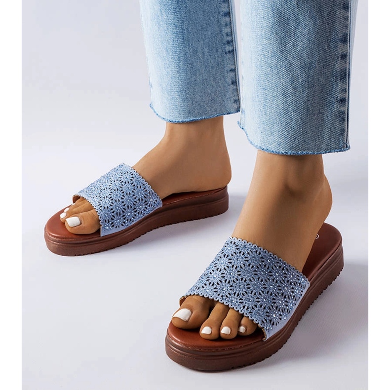 Blå genombrutna reglage med zirkoner från Irvine 1